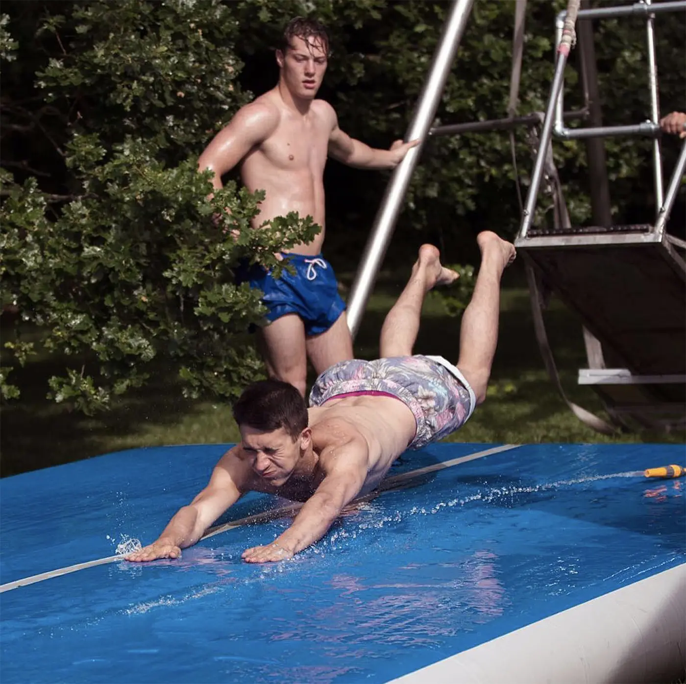 Slip n slide damien walters on blue airtrack