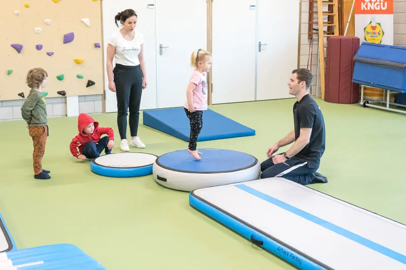 Toddler on AirSpot with teacher